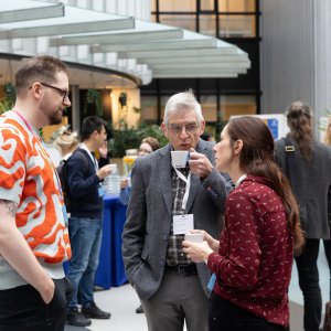 People in conversation at NOSF