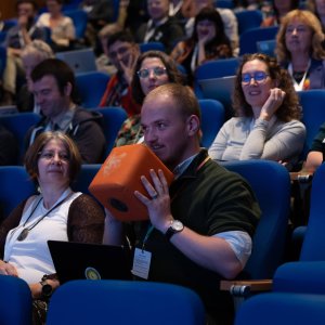 a question from the audience at the plenary opening session