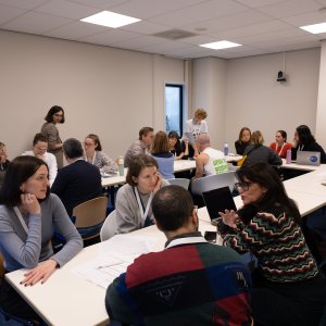 A group of people attending the second workshop round